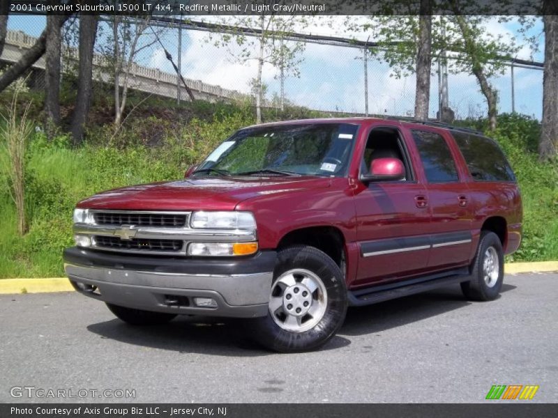 Redfire Metallic / Light Gray/Neutral 2001 Chevrolet Suburban 1500 LT 4x4