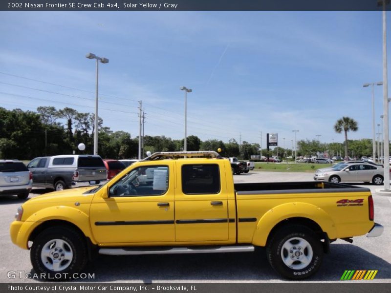  2002 Frontier SE Crew Cab 4x4 Solar Yellow
