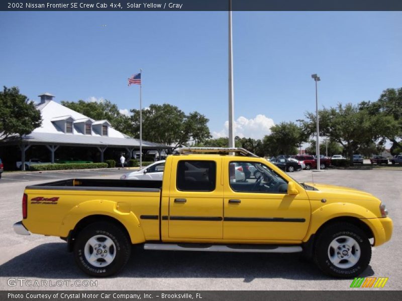  2002 Frontier SE Crew Cab 4x4 Solar Yellow