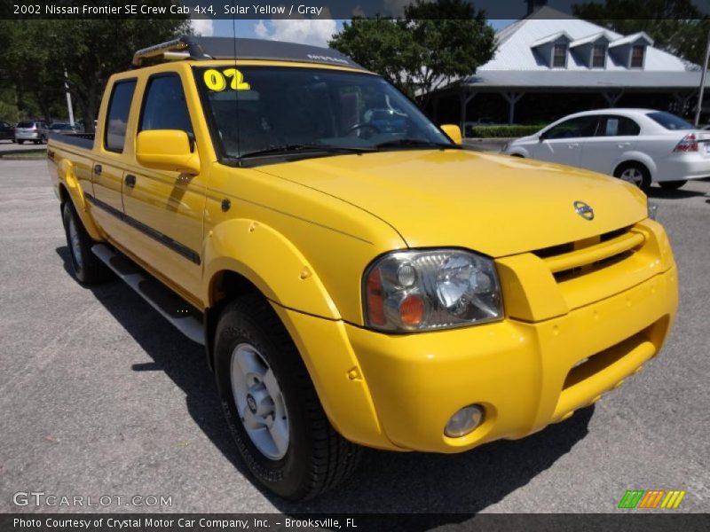 Front 3/4 View of 2002 Frontier SE Crew Cab 4x4