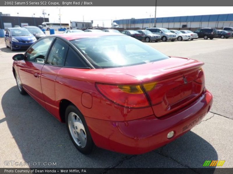 Bright Red / Black 2002 Saturn S Series SC2 Coupe