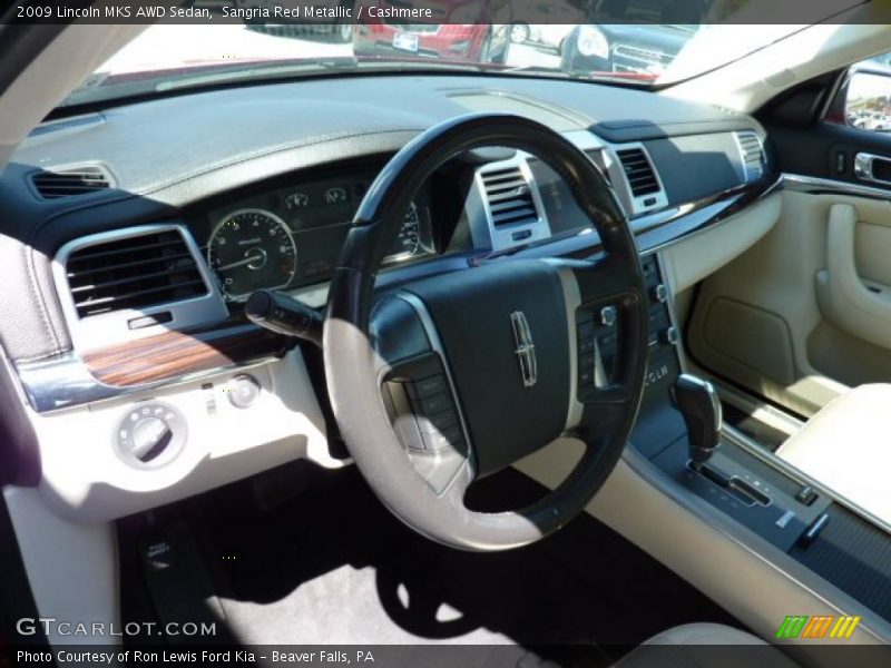 Sangria Red Metallic / Cashmere 2009 Lincoln MKS AWD Sedan