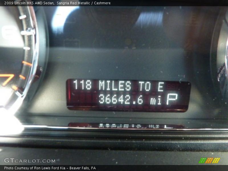Sangria Red Metallic / Cashmere 2009 Lincoln MKS AWD Sedan