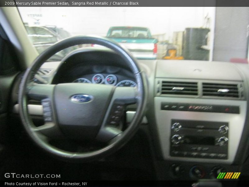 Sangria Red Metallic / Charcoal Black 2009 Mercury Sable Premier Sedan