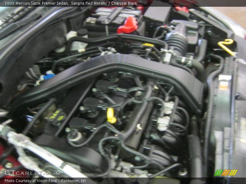 Sangria Red Metallic / Charcoal Black 2009 Mercury Sable Premier Sedan