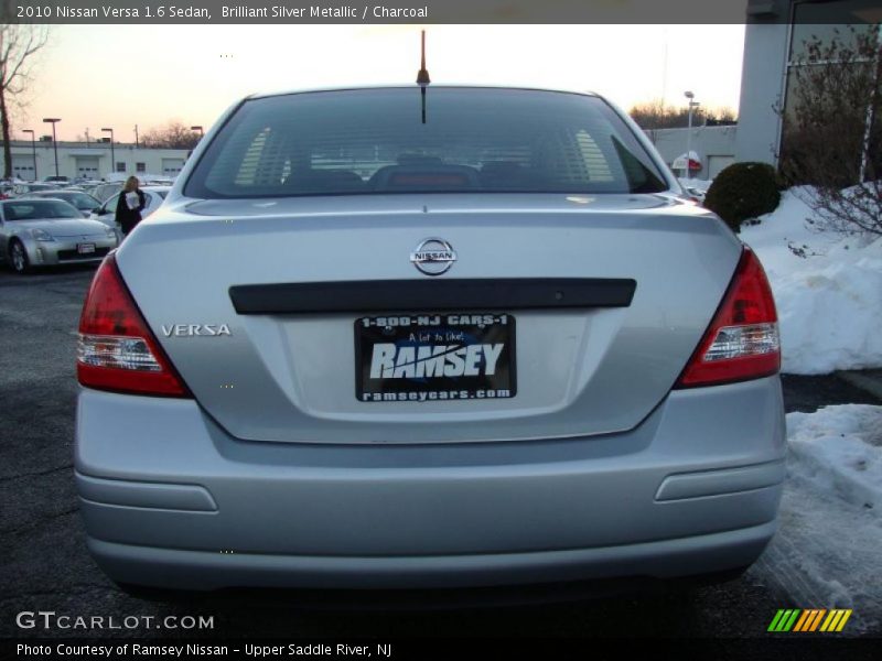 Brilliant Silver Metallic / Charcoal 2010 Nissan Versa 1.6 Sedan
