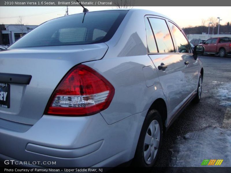 Brilliant Silver Metallic / Charcoal 2010 Nissan Versa 1.6 Sedan