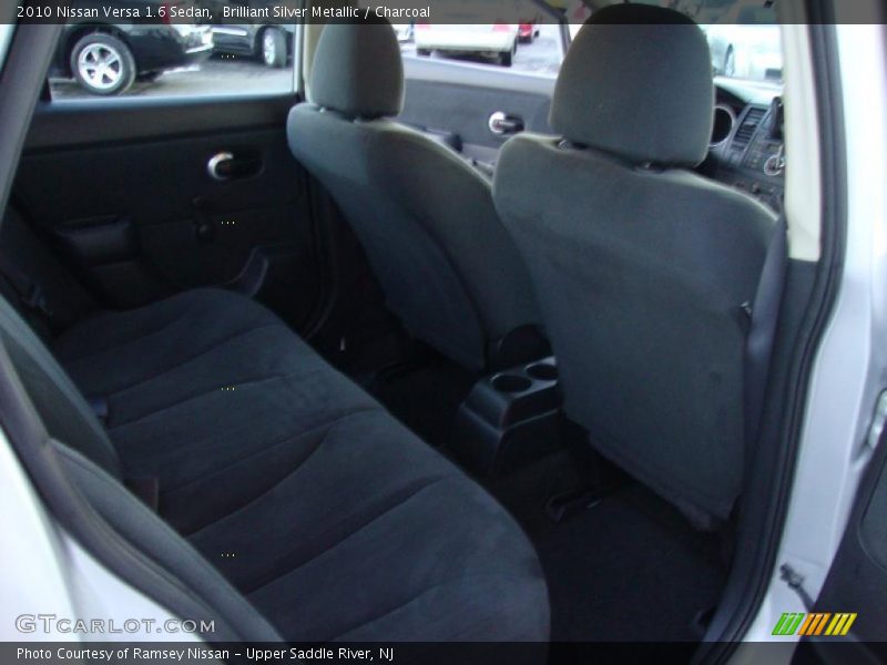 Brilliant Silver Metallic / Charcoal 2010 Nissan Versa 1.6 Sedan