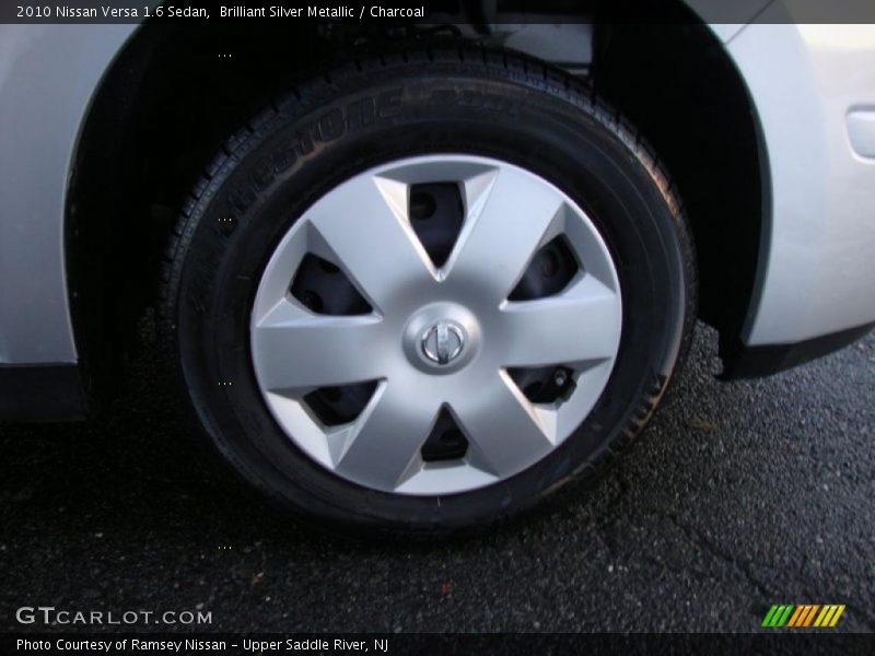 Brilliant Silver Metallic / Charcoal 2010 Nissan Versa 1.6 Sedan