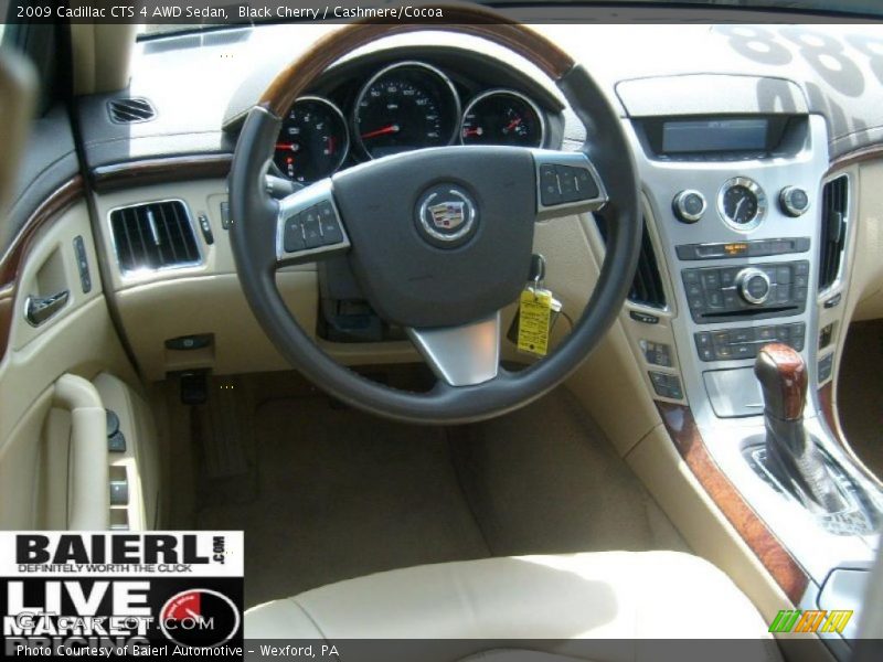 Black Cherry / Cashmere/Cocoa 2009 Cadillac CTS 4 AWD Sedan