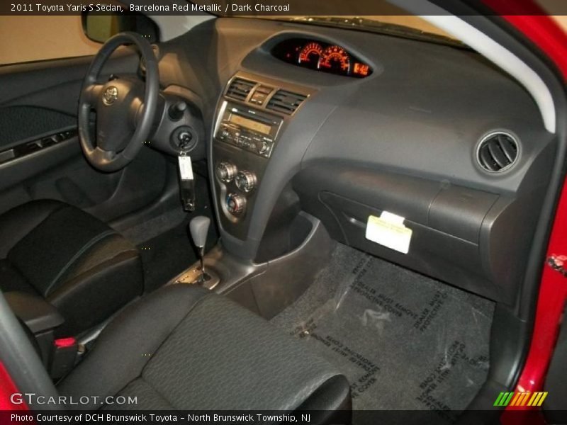 Barcelona Red Metallic / Dark Charcoal 2011 Toyota Yaris S Sedan