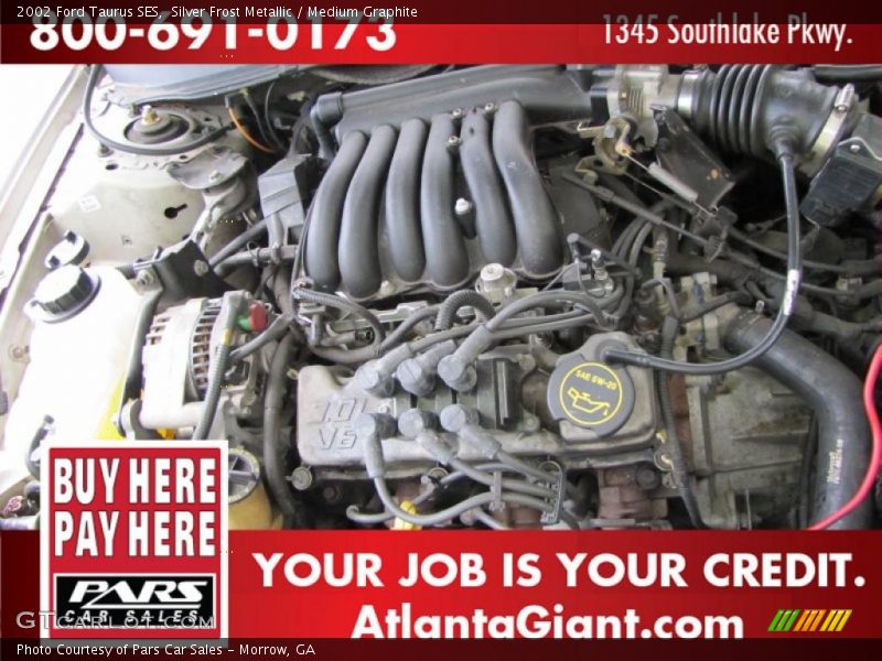 Silver Frost Metallic / Medium Graphite 2002 Ford Taurus SES