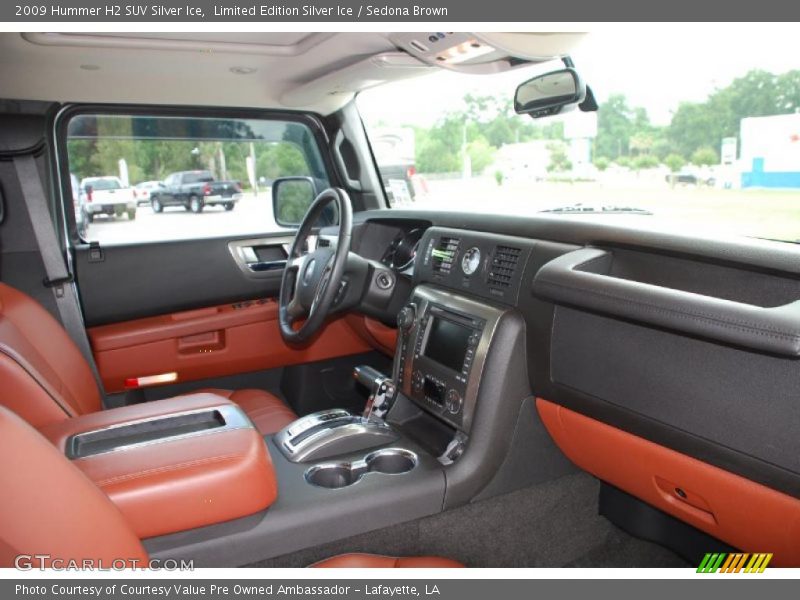  2009 H2 SUV Silver Ice Sedona Brown Interior