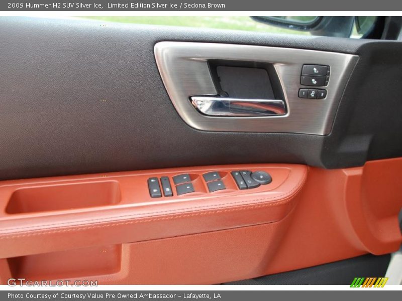 Controls of 2009 H2 SUV Silver Ice