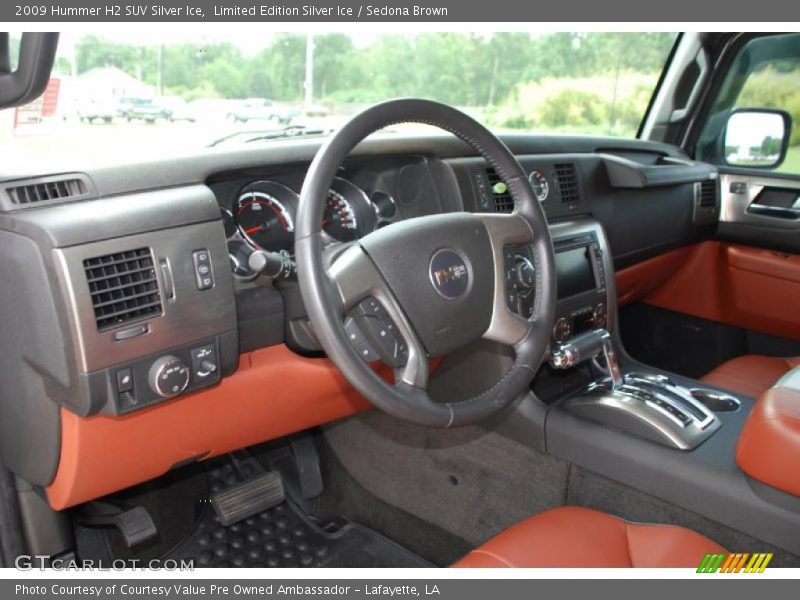  2009 H2 SUV Silver Ice Sedona Brown Interior