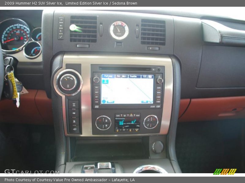 Controls of 2009 H2 SUV Silver Ice