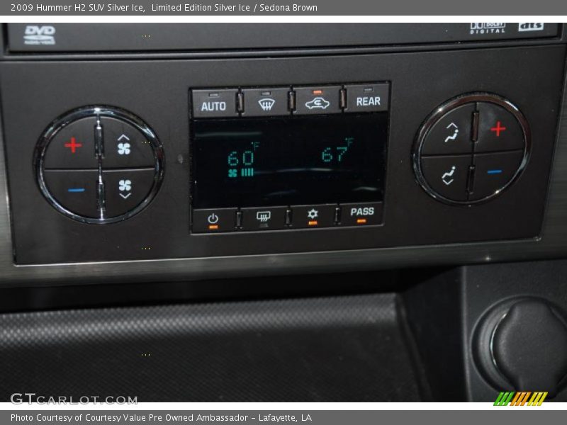 Controls of 2009 H2 SUV Silver Ice