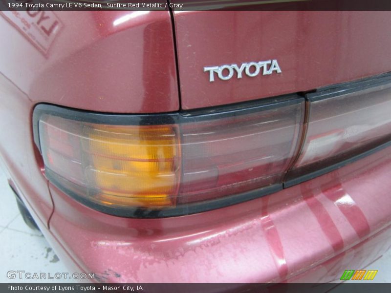 Sunfire Red Metallic / Gray 1994 Toyota Camry LE V6 Sedan