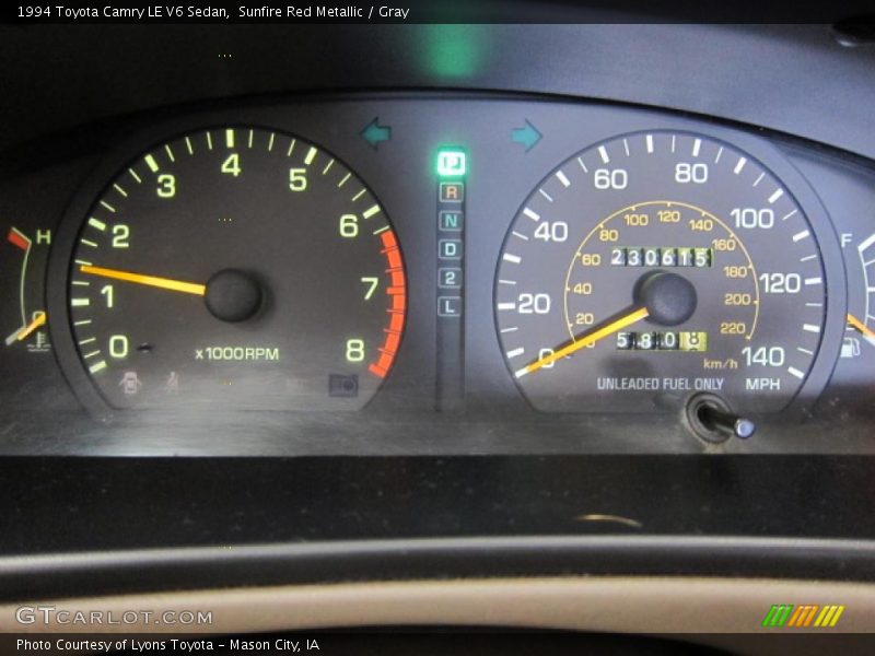 Sunfire Red Metallic / Gray 1994 Toyota Camry LE V6 Sedan