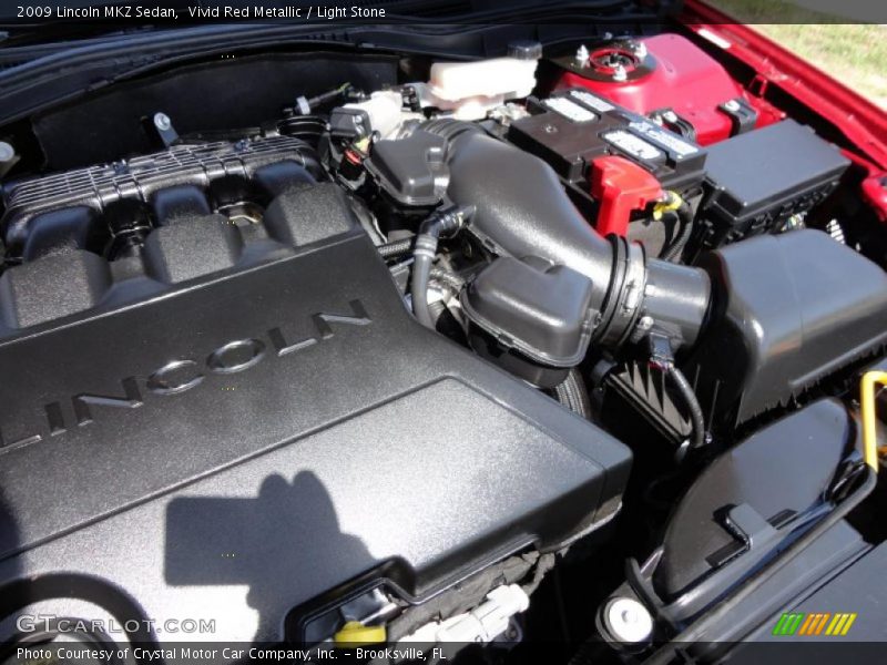 Vivid Red Metallic / Light Stone 2009 Lincoln MKZ Sedan