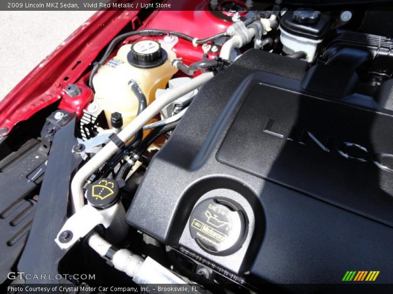 Vivid Red Metallic / Light Stone 2009 Lincoln MKZ Sedan