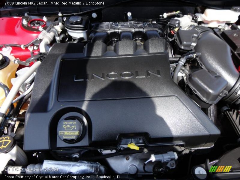 Vivid Red Metallic / Light Stone 2009 Lincoln MKZ Sedan