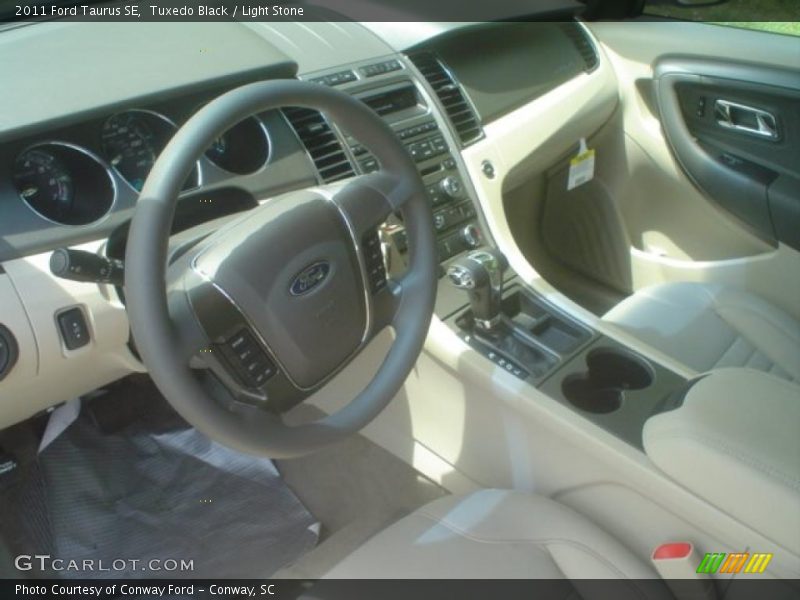 Tuxedo Black / Light Stone 2011 Ford Taurus SE