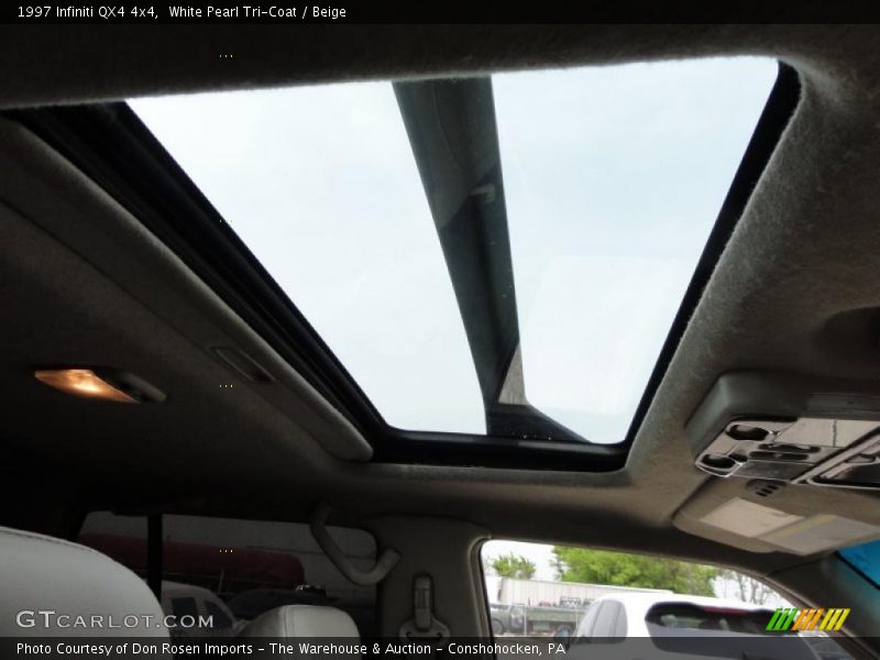 White Pearl Tri-Coat / Beige 1997 Infiniti QX4 4x4