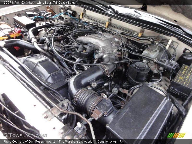 White Pearl Tri-Coat / Beige 1997 Infiniti QX4 4x4