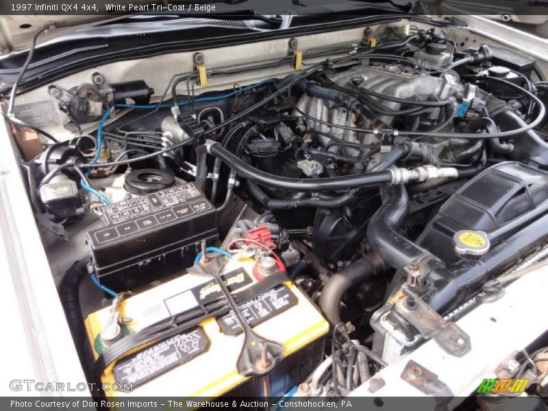 White Pearl Tri-Coat / Beige 1997 Infiniti QX4 4x4