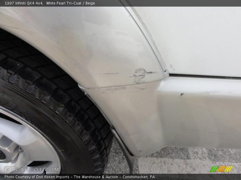 White Pearl Tri-Coat / Beige 1997 Infiniti QX4 4x4