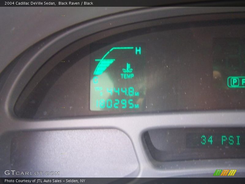 Black Raven / Black 2004 Cadillac DeVille Sedan