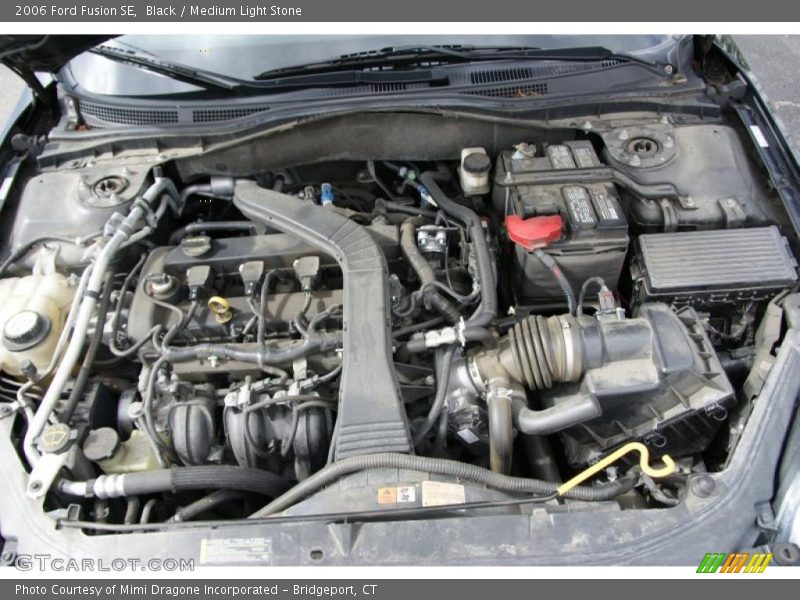 Black / Medium Light Stone 2006 Ford Fusion SE
