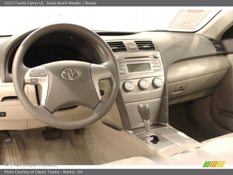 Sandy Beach Metallic / Bisque 2010 Toyota Camry LE