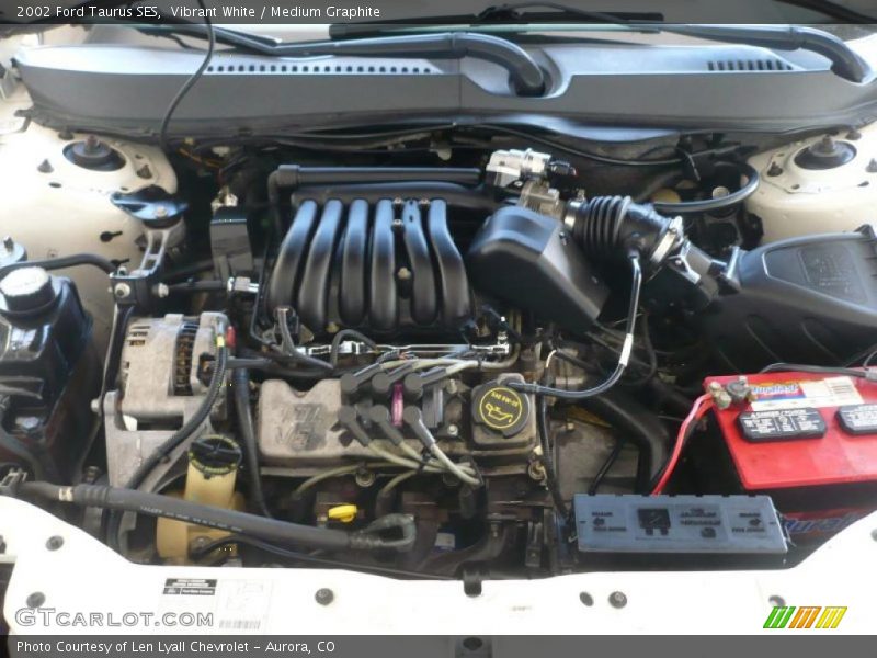 Vibrant White / Medium Graphite 2002 Ford Taurus SES