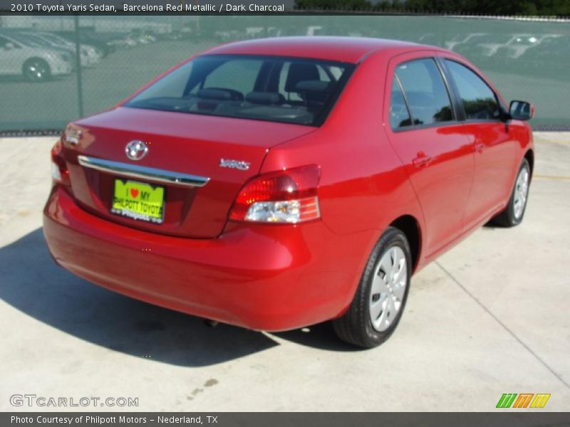 Barcelona Red Metallic / Dark Charcoal 2010 Toyota Yaris Sedan