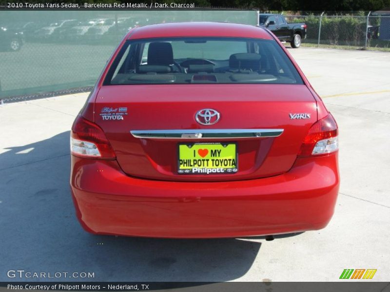 Barcelona Red Metallic / Dark Charcoal 2010 Toyota Yaris Sedan