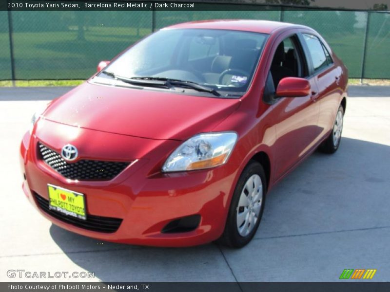 Barcelona Red Metallic / Dark Charcoal 2010 Toyota Yaris Sedan