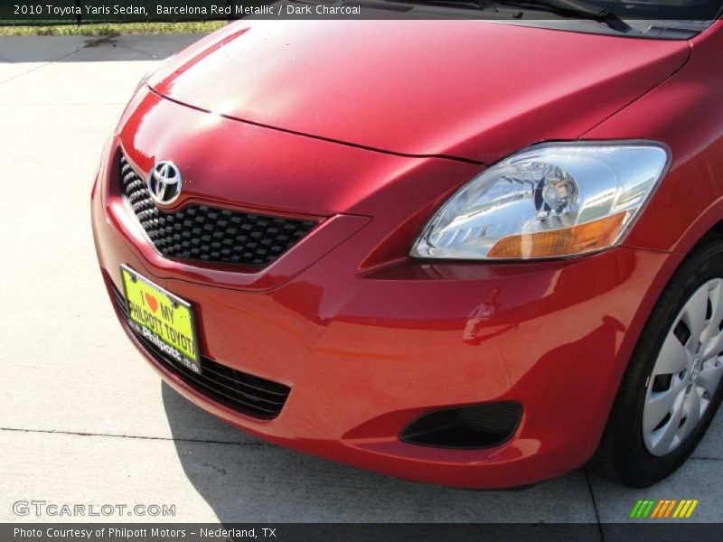 Barcelona Red Metallic / Dark Charcoal 2010 Toyota Yaris Sedan