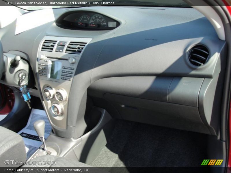 Barcelona Red Metallic / Dark Charcoal 2010 Toyota Yaris Sedan