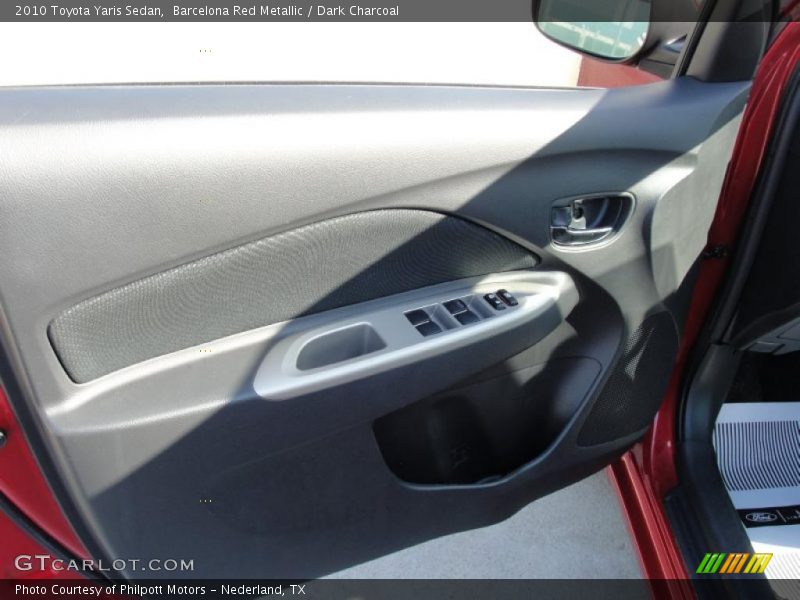 Barcelona Red Metallic / Dark Charcoal 2010 Toyota Yaris Sedan