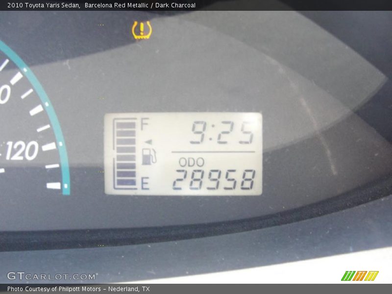 Barcelona Red Metallic / Dark Charcoal 2010 Toyota Yaris Sedan