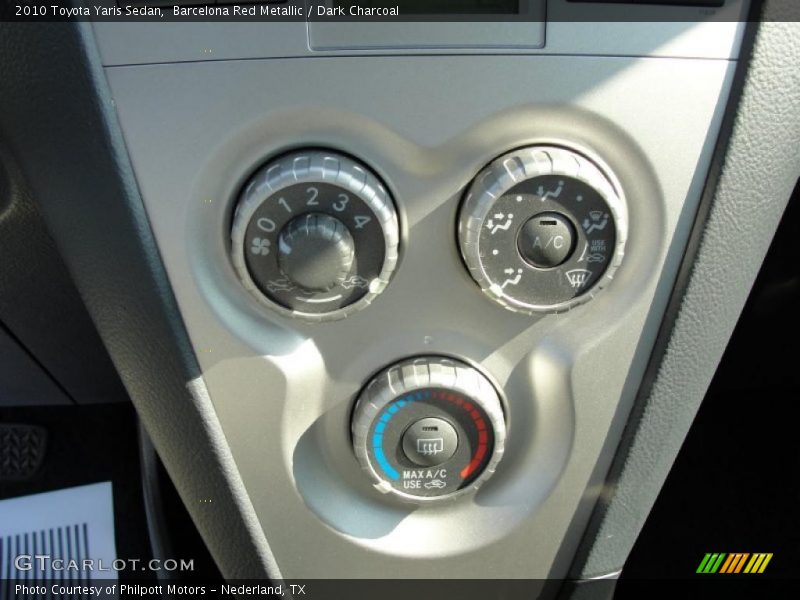 Barcelona Red Metallic / Dark Charcoal 2010 Toyota Yaris Sedan