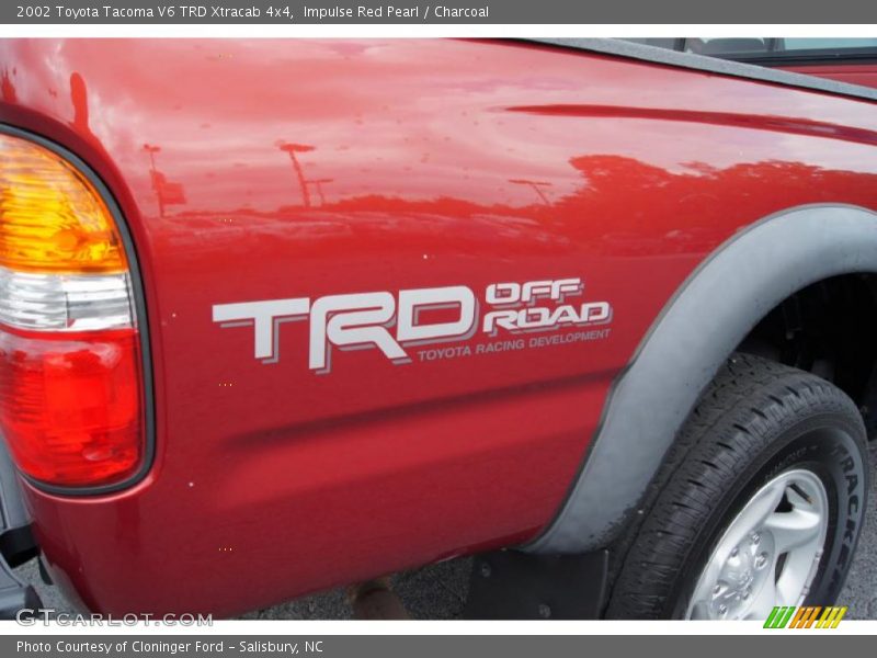 Impulse Red Pearl / Charcoal 2002 Toyota Tacoma V6 TRD Xtracab 4x4