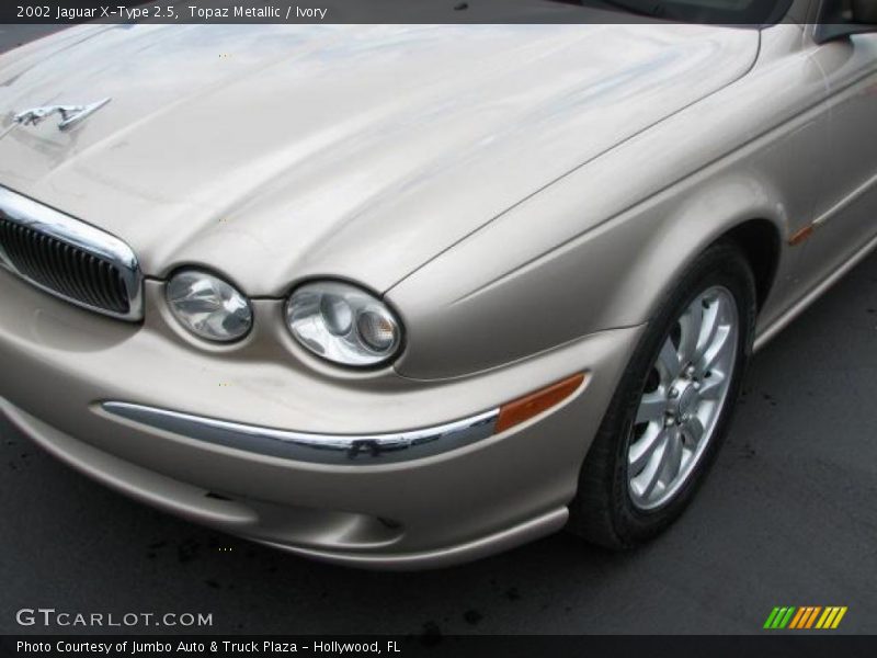 Topaz Metallic / Ivory 2002 Jaguar X-Type 2.5