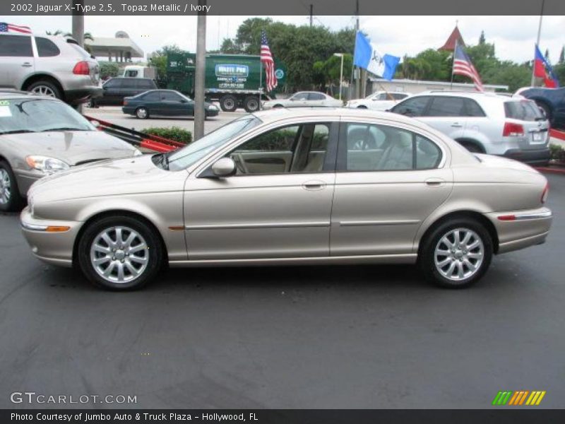 Topaz Metallic / Ivory 2002 Jaguar X-Type 2.5