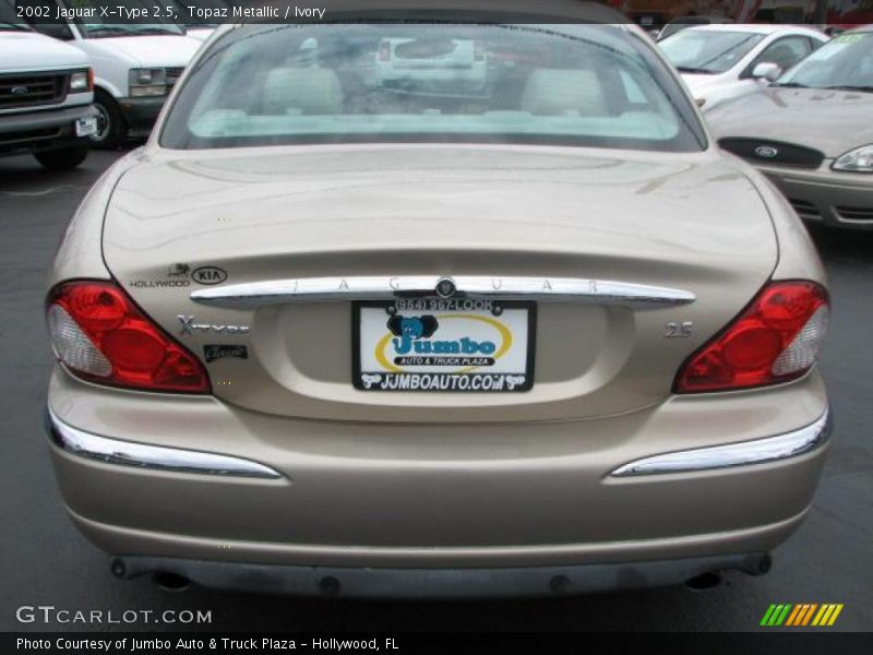 Topaz Metallic / Ivory 2002 Jaguar X-Type 2.5