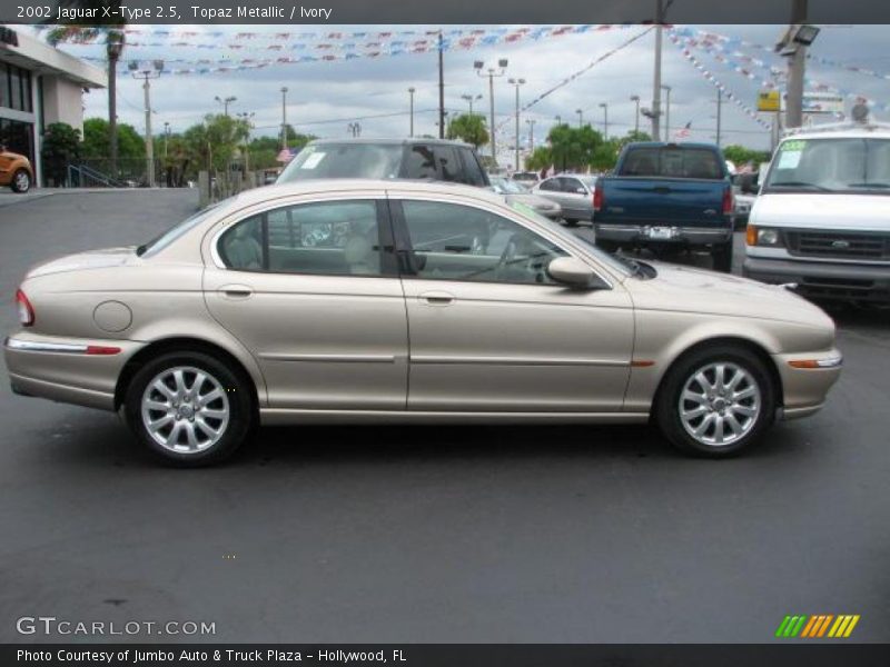 Topaz Metallic / Ivory 2002 Jaguar X-Type 2.5