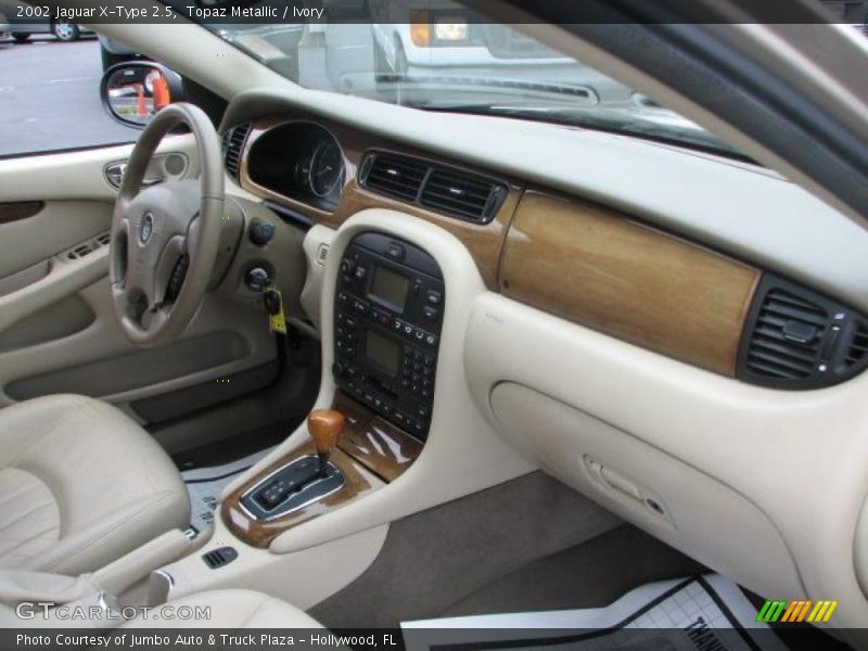 Topaz Metallic / Ivory 2002 Jaguar X-Type 2.5