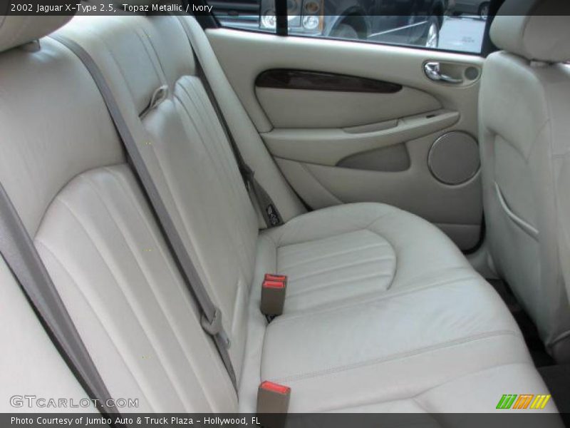 Topaz Metallic / Ivory 2002 Jaguar X-Type 2.5